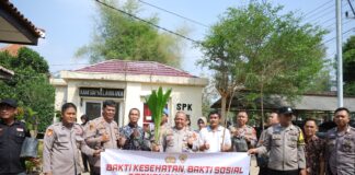 Dalam Rangka Rakorbin SDM Tahun 2023, Polres Pringsewu Gelar Bansos Dan Penanaman Pohon