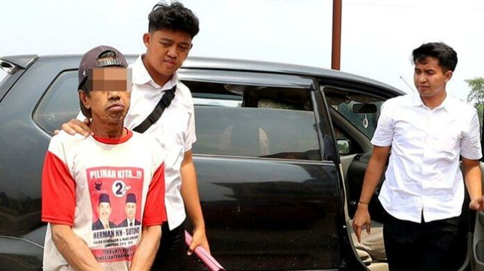 Pelaku-asusila-AS-54-saat-ditangkap-polisi